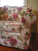floral-print sofa slipcovered by Take Cover